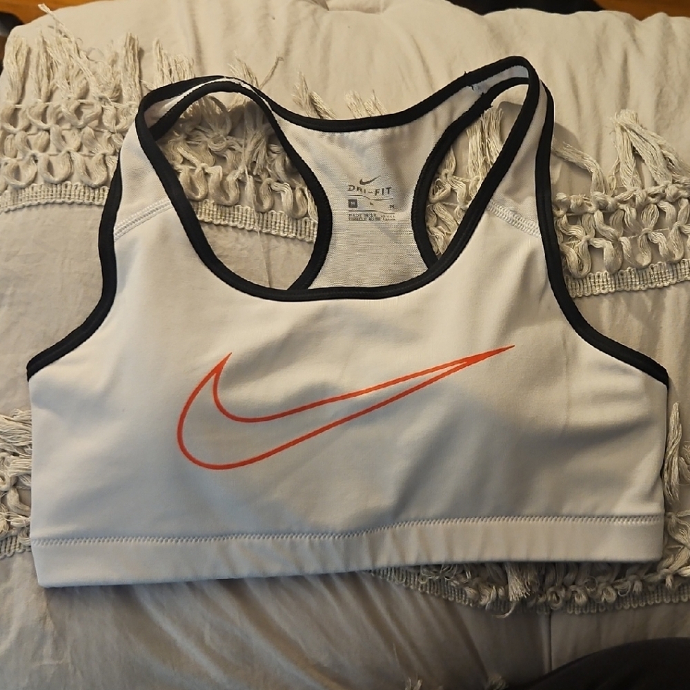 Nike White Sports Bra with Black Trim and Coral Red/ Orange Swoosh
